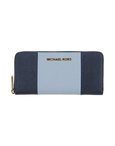 michael kors slim wallet in electric blue|Michael Kors oversized wallet.